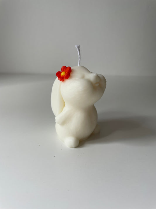 Vela conejo flor naranja