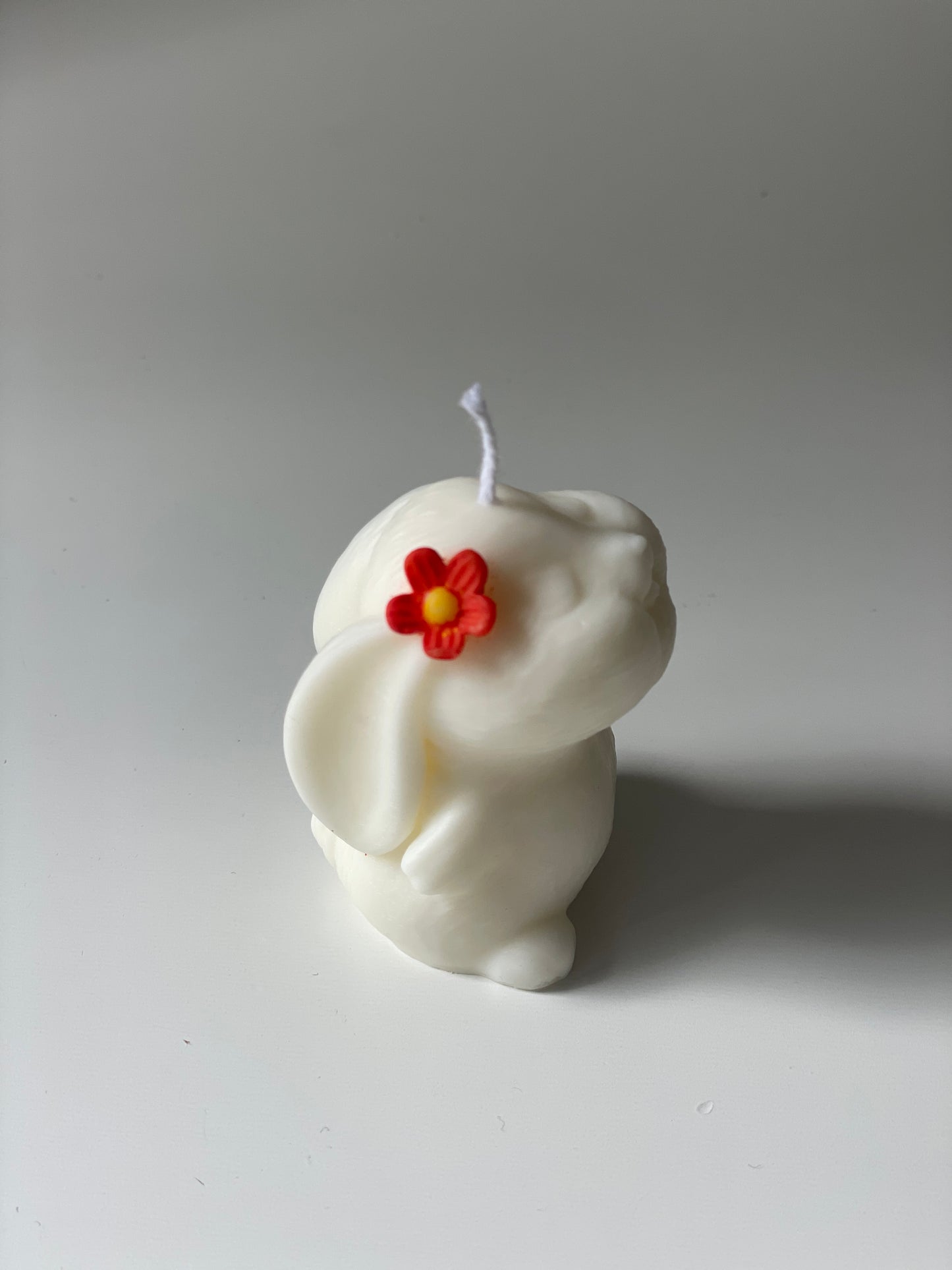Vela conejo flor naranja