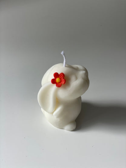Vela conejo flor naranja