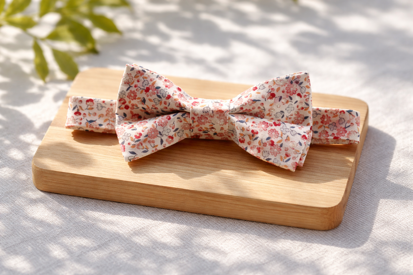 Pajarita flores vino